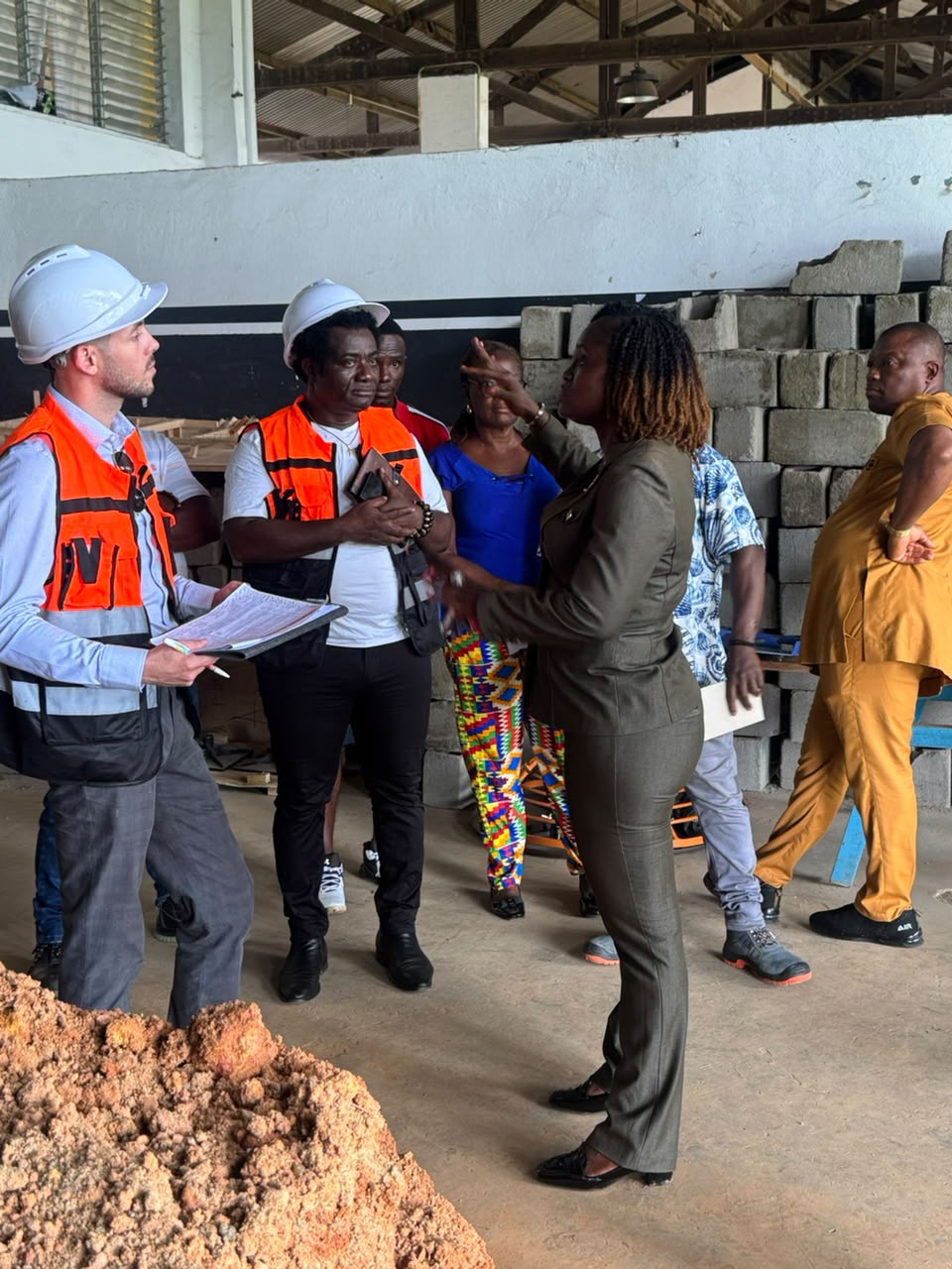 The iECD team touring an MVTC training shop with the Director and staff