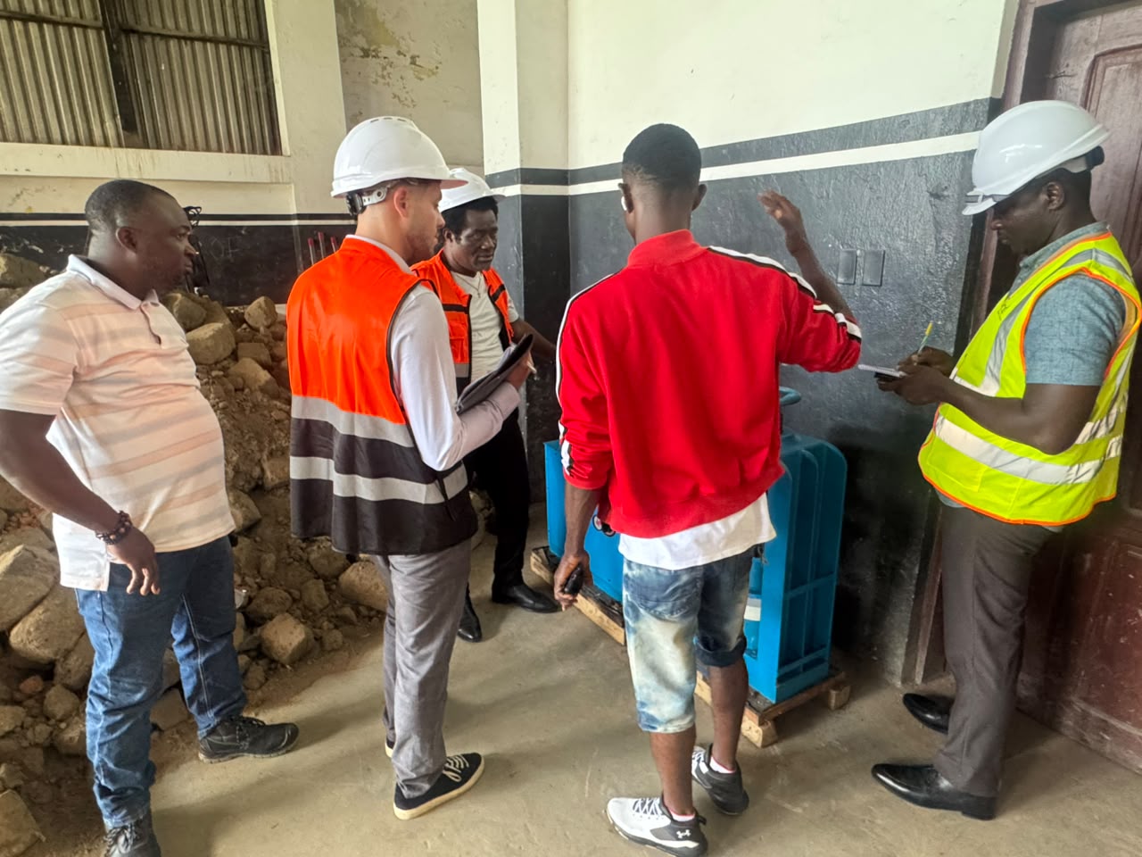iECD team and MVTC staff inspecting a training facility